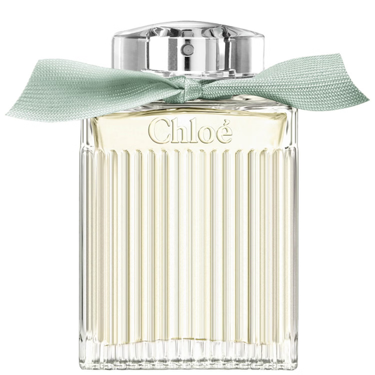 Chloe perfume bottle with a green ribbon on a white background