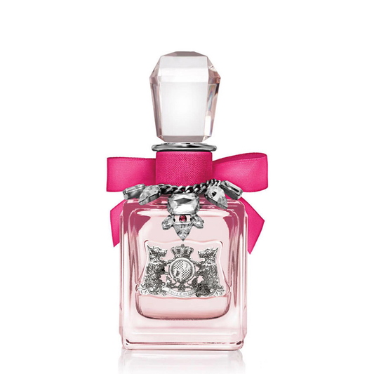 JUICY COUTURE LA LA perfume bottle with a decorative bow on a white background