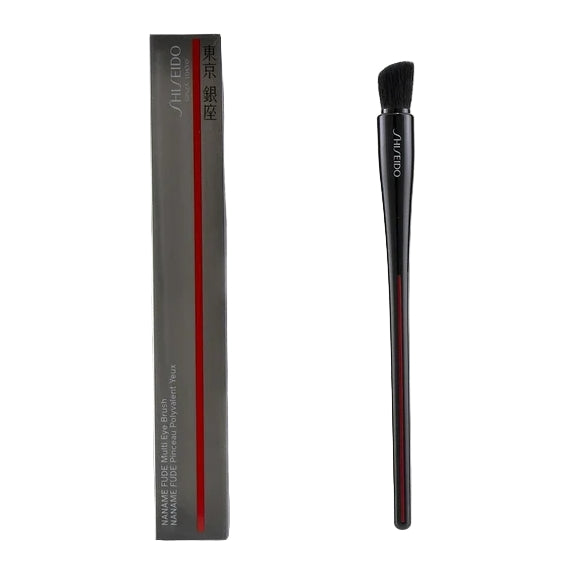 Shiseido makeup brush with packaging on a white background