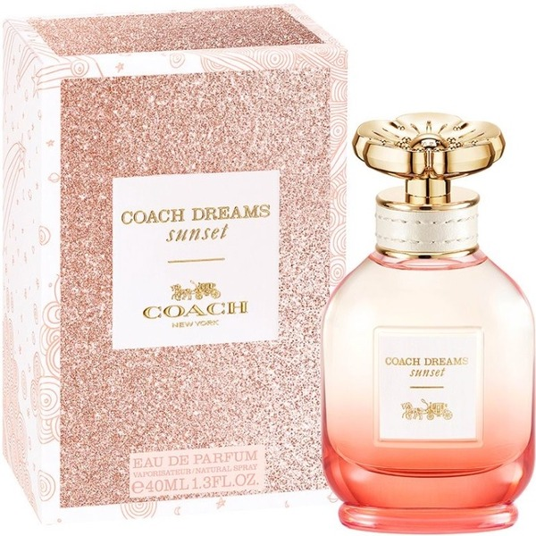 Coach Dreams Sunset perfume bottle and packaging on a white background