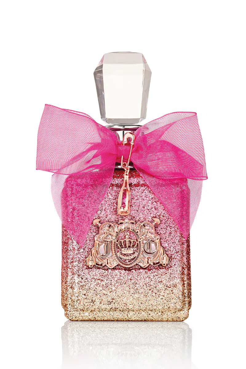 Pink and gold glittery perfume bottle with a pink bow on a white background
