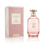 Coach Dreams Shimmer perfume bottle and packaging on a white background