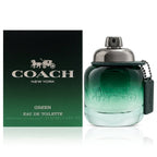 Green perfume bottle with silver cap and packaging on a white background