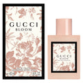 Gucci Bloom perfume bottle with floral design on packaging