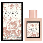Gucci Bloom perfume bottle with floral design on packaging