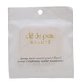 Clé de peau Beauté sponge packaging with gold text on a white background