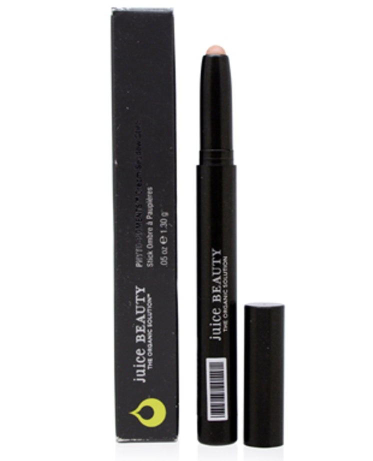 Black cosmetic stick with cap and Juice Beauty packaging on a white background
