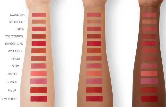 Color swatches of lipsticks on three different skin tones against a white background