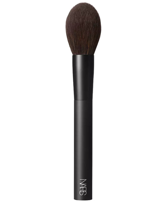 Black makeup brush with brown bristles on a white background, featuring the NARS logo.