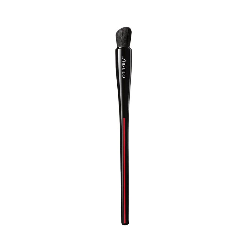 Makeup brush with Shiseido branding on a white background