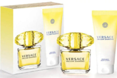 Versace Yellow Diamond perfume set with bottle, box, and body lotion on a white background