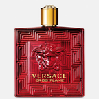 Versace Eros Flame perfume bottle with red design and gold cap on a light gray background