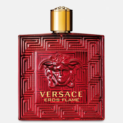 Versace Eros Flame perfume bottle with red design and gold cap on a light gray background